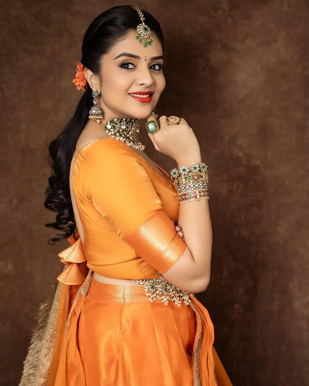 ETV Actress Sreemukhi in Orange Lehenga Blue Choli